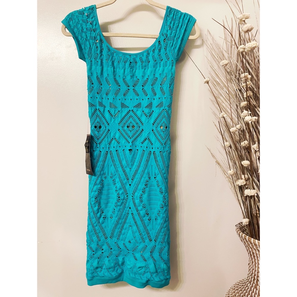 NWT Bebe Tribeca Laced Dress in Blue. Size M/L. Never worn. Fully lined.